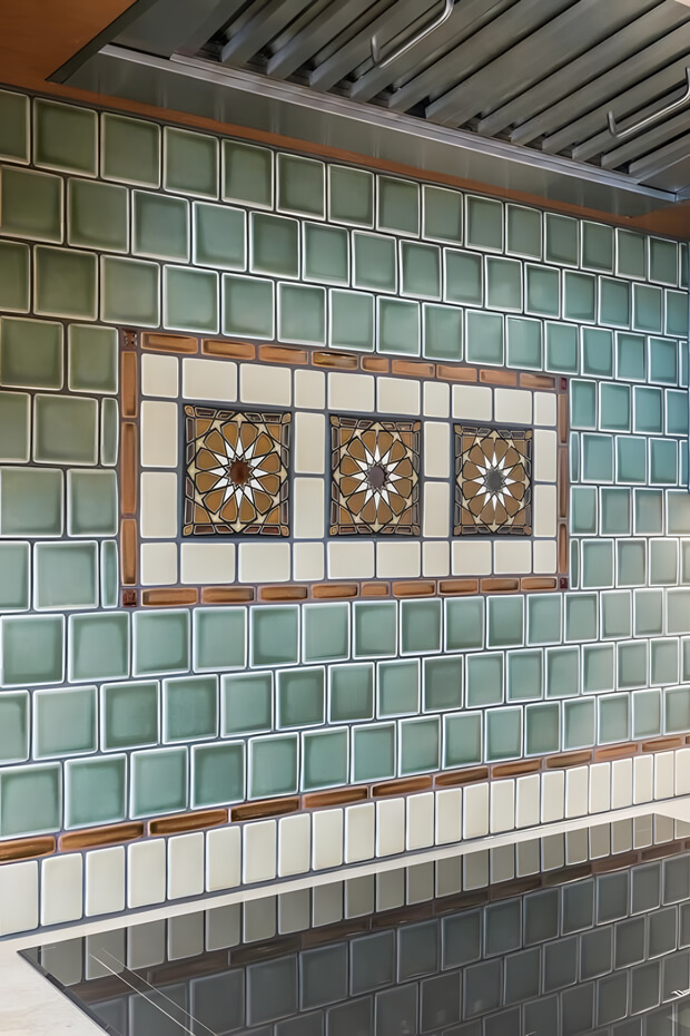 Green and white diamond patterned ceramic kitchen backsplash tiles