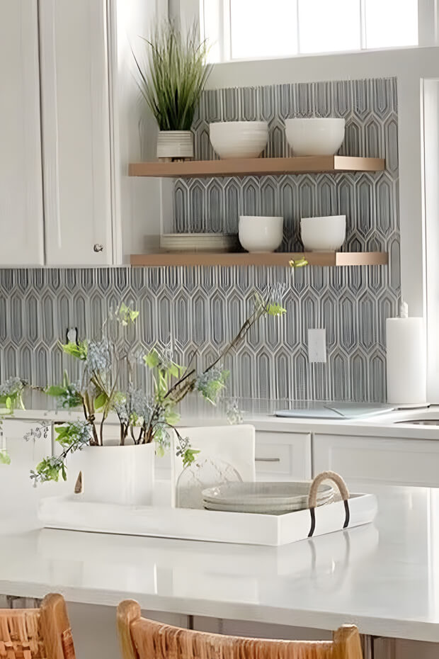 Irregularly shaped ceramic kitchen backsplash tiles with mix of colors and patterns