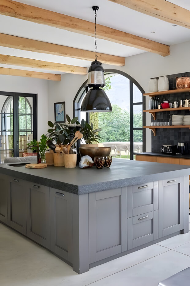 Rustic industrial style pendant lights above kitchen island