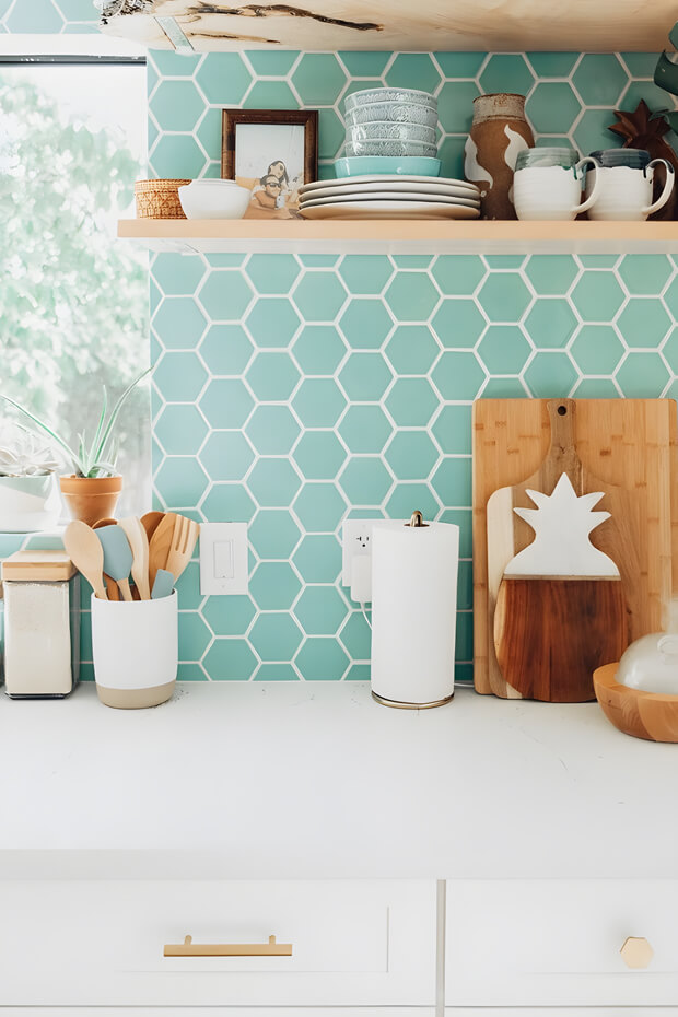 Turquoise and white hexagonal kitchen backsplash tiles with white grout