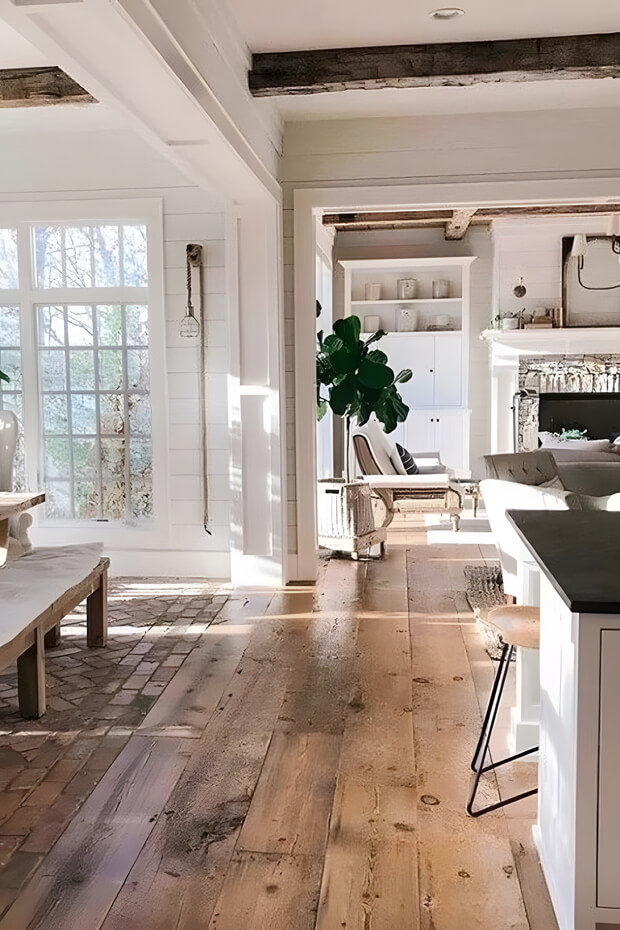 Well-lit countryside kitchen with wooden accents