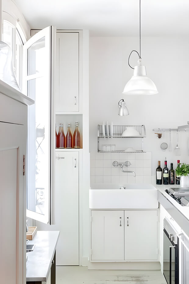 White-themed countryside kitchen with appliances